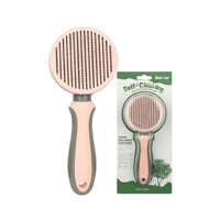 Self-Cleaning Pet Deshedding Comb — in use